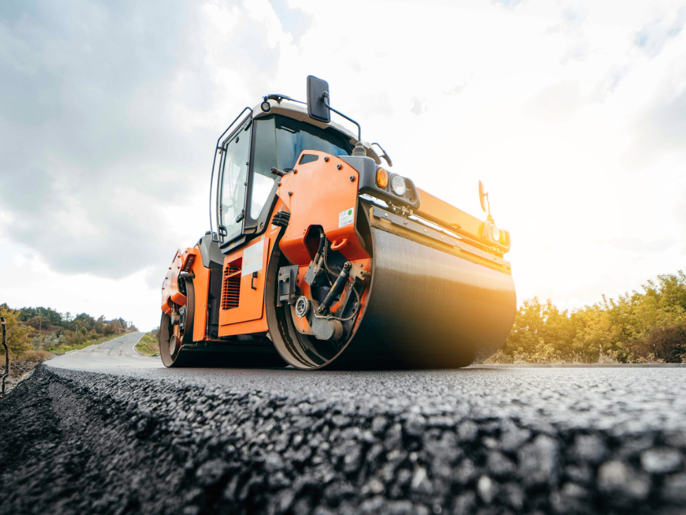 A Road Roller on a newly laid asphalt road