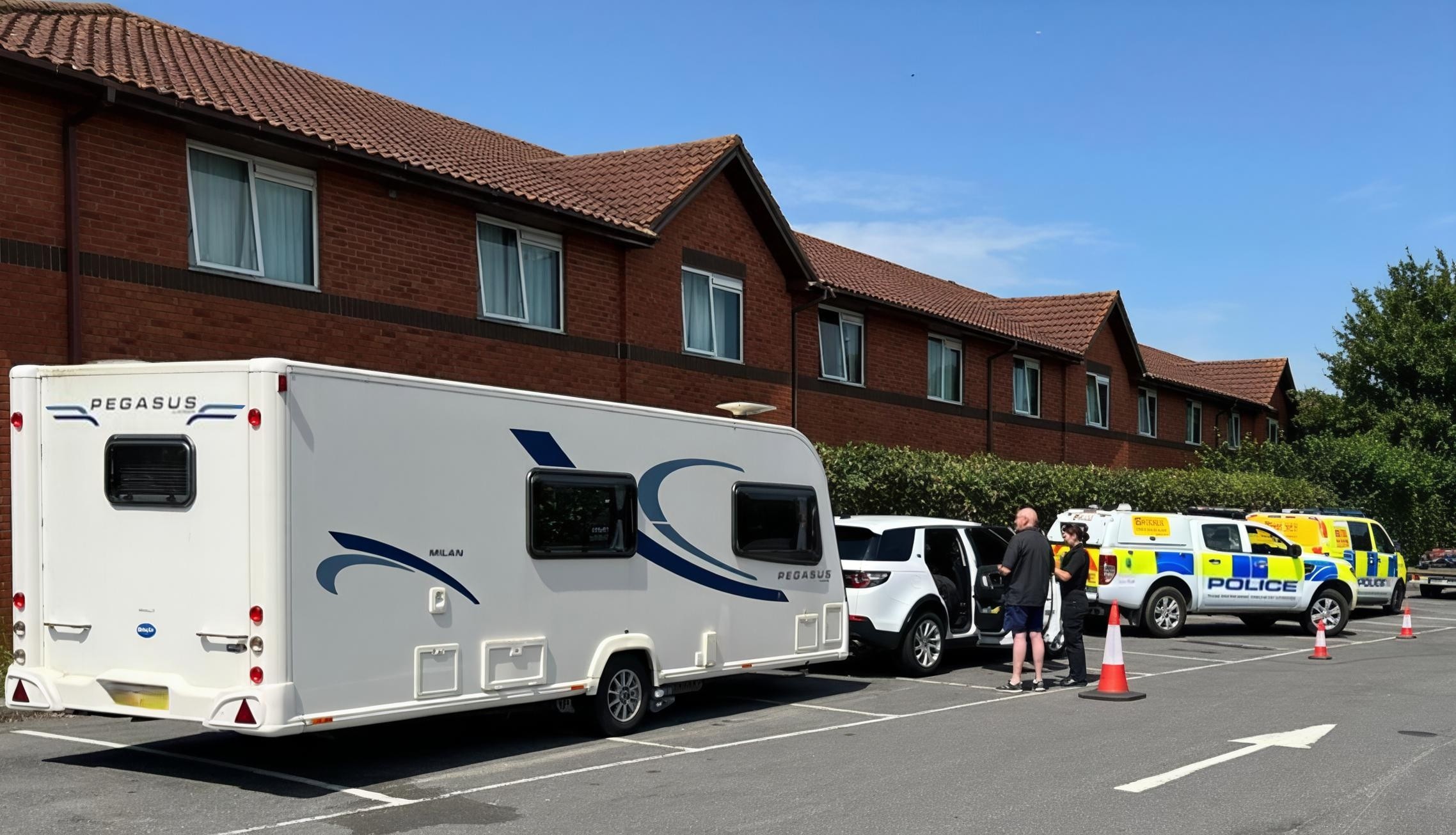 Police roadside check on caravan