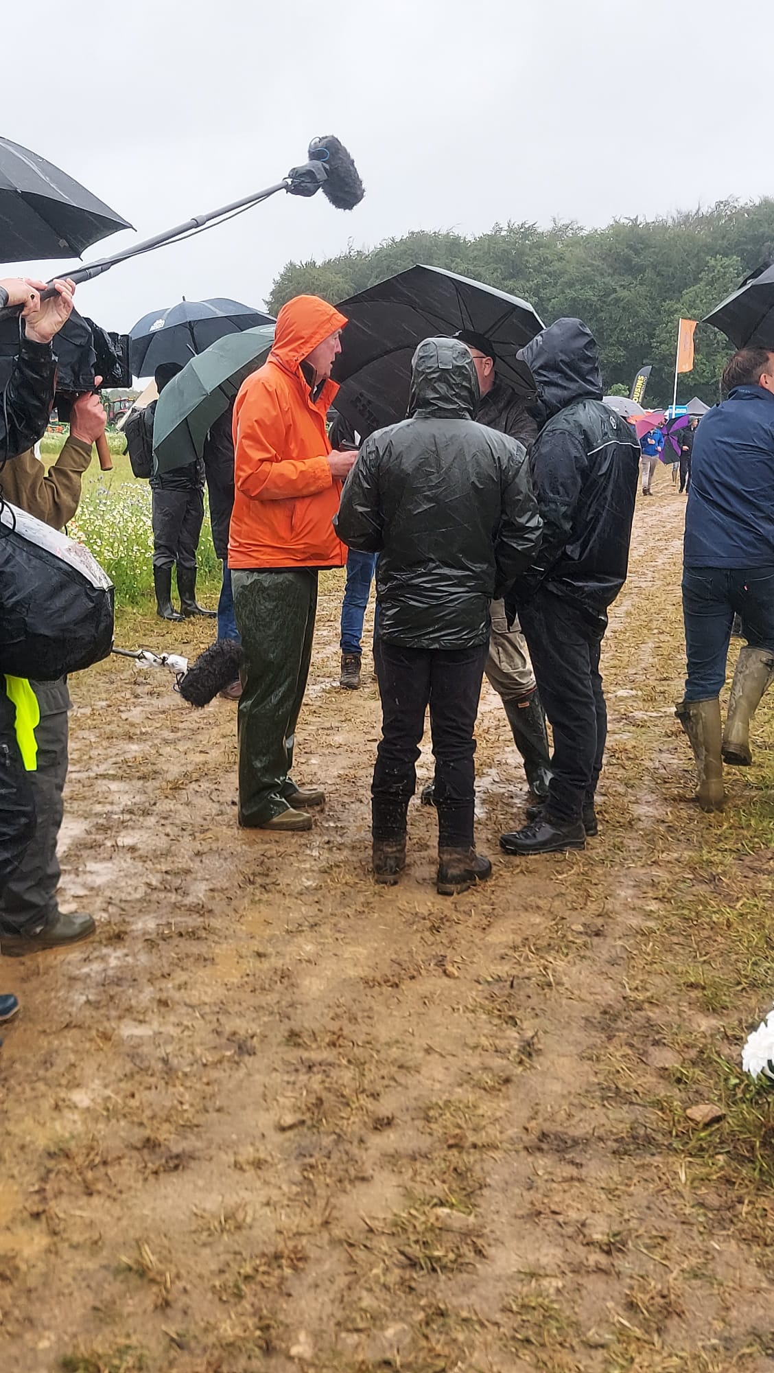 Jeremy Clarkson being interviewed by the media at the Cereals Event 2026 during wet weather.