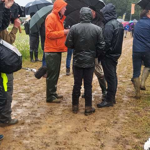 Jeremy Clarkson being interviewed by the media at the Cereals Event 2026 during wet weather.