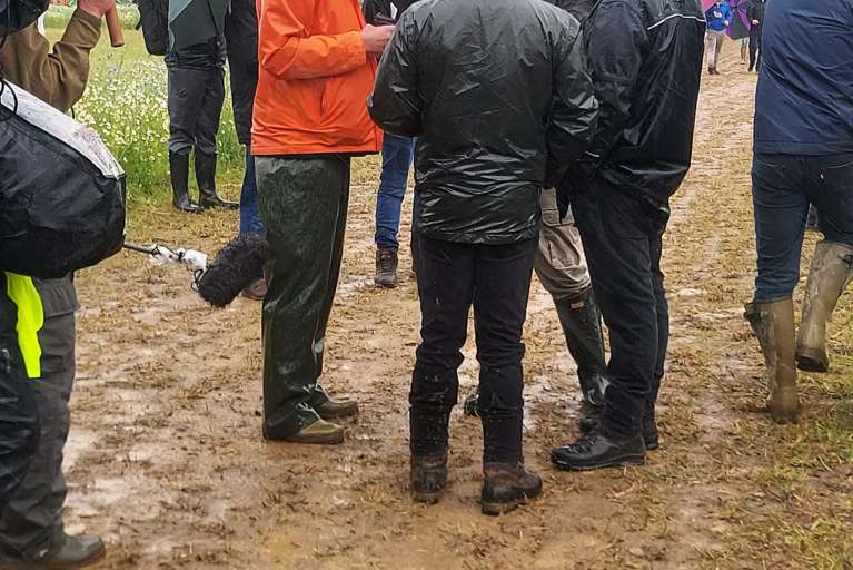 Jeremy Clarkson being interviewed by the media at the Cereals Event 2026 during wet weather.