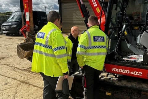 Nick Conducting Training On How To Identify Stolen Machinery And Police Officers Listening Edited