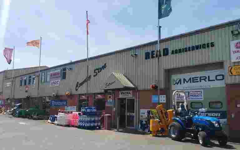 Front of Read Agriservices premises displaying a range of agricultural machinery in Somerset