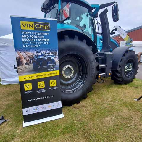Agricultural tractor displayed alongside the VIN Chip banner at the Royal Highland Show 2026.