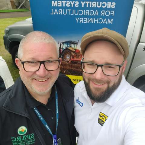 Stuart Ward of Scottish Partnership Against Rural Crime (SPARC) and Mike Morton of VIN Chip at the Royal Highland Show 2026 in front of the VIN Chip banner.