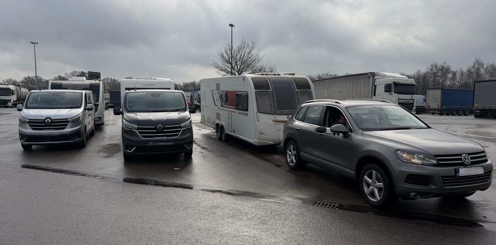 Three caravans being towed after being recovered from theft.